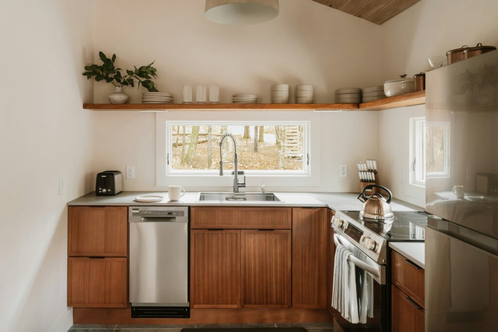 cozy small kitchen wood cabinets open shelf window